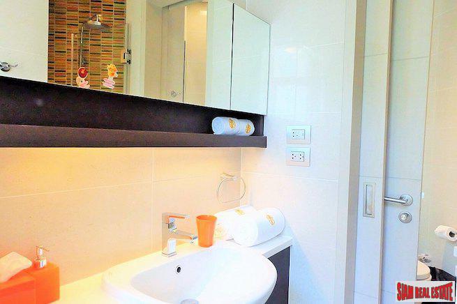 Cassia Residence | Fully Furnished Two Storey One Bedroom Laguna Condo for Sale with Lagoon & Garden Views