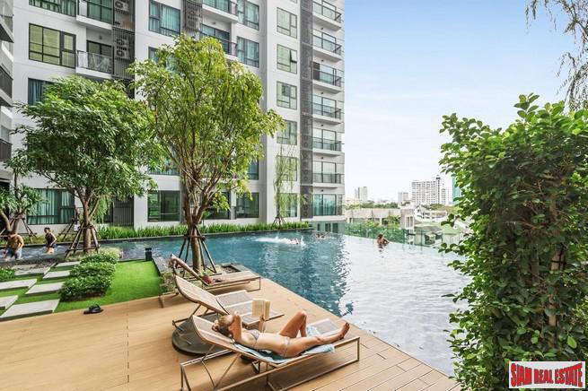 Rhythm Sukhumvit 36 | Comfortable One Bedroom Thong Lo Condo for Rent with City & Pool Views